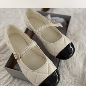Elegant Cream and Black Quilted Mary Jane Shoes